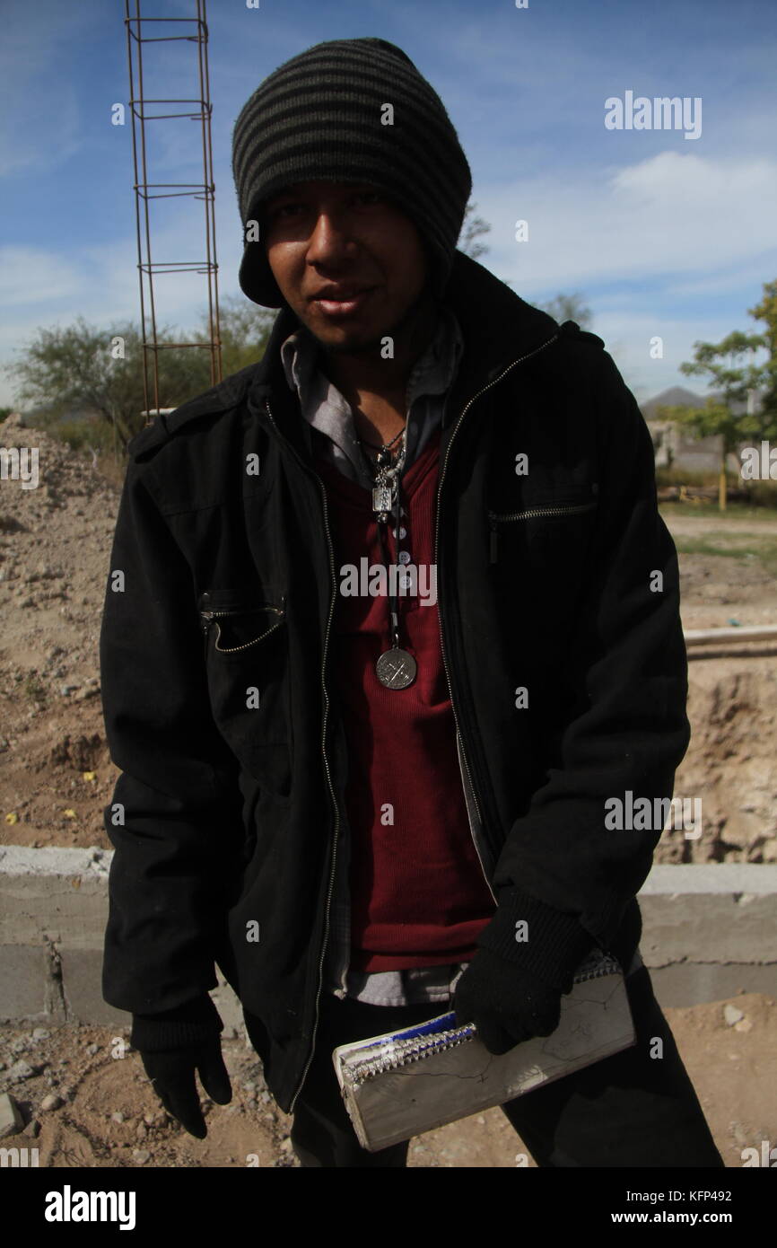Migrantes Hondureños durante su paso por Hermosillo con rumbo al Norte se reúnen en un comedor a punto de medio dÃa. .staff /nortephoto.com,CREDITO OBLIGATORIO*** Luis Gustavo Matute migrante viajero de origen Hodureño en su paso por Hermosillo, Sonora Mexico. Stock Photo