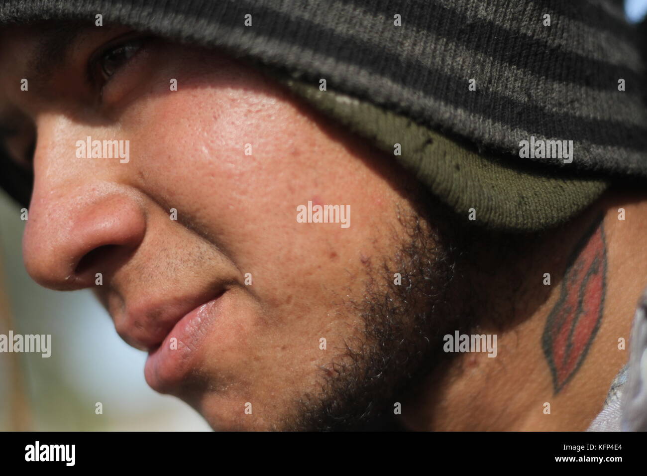 Migrantes Hondureños durante su paso por Hermosillo con rumbo al Norte se reúnen en un comedor a punto de medio dÃa. .Staff /nortephoto.com**CREDITO OBLIGATORIO** Luis Gustavo Matute migrante viajero de origen Hodureño en su paso por Hermosillo, Sonora Mexico. Stock Photo