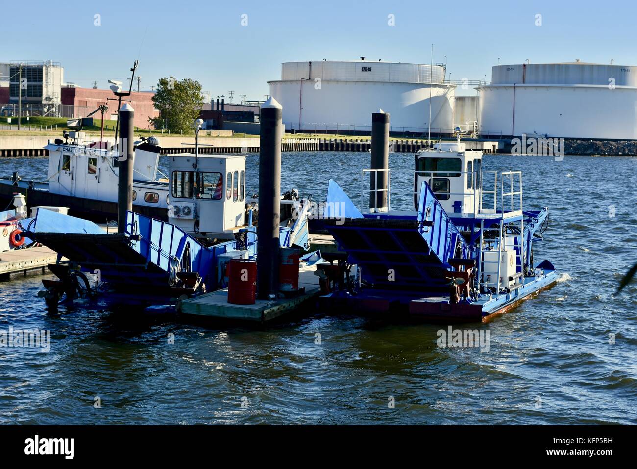 Small industrial barge boats on the Baltimore harbor Stock Photo Alamy