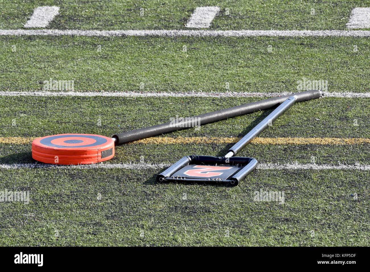 Football field yard markers laying on the sideline Stock Photo Alamy