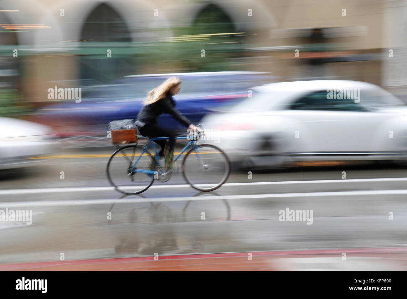 Cyclist in motion on a Street of California Stock Photo