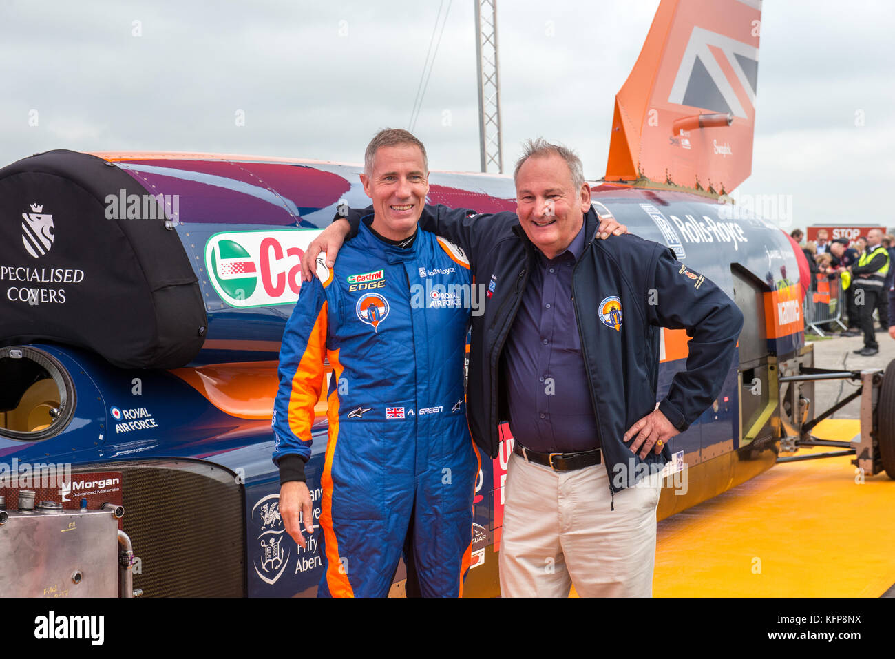 Andy Green (driver) and Richard Noble (project director) pose for a photograph after the Bloodhound completes its 200mph test run at Newquay Airport. Stock Photo