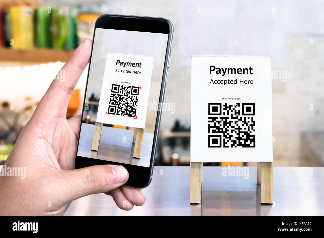 Qr Code Payment , Online Shopping , Cashless Technology Concept. Coffee Shop  Accepted Digital Pay Without Money , Plastic Tag On Table And Hand Using  Stock Photo - Alamy