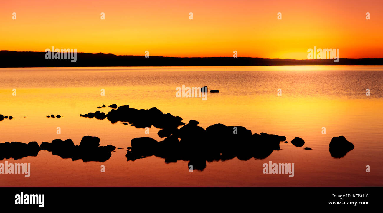 Amazing sunset with golden and black colors Stock Photo - Alamy
