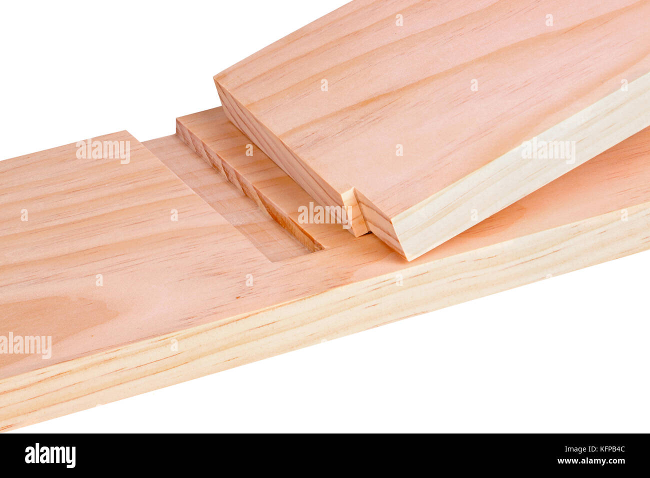 Close-up of two pine boards cut for a blind or stopped dado joint isolated against a white background Stock Photo