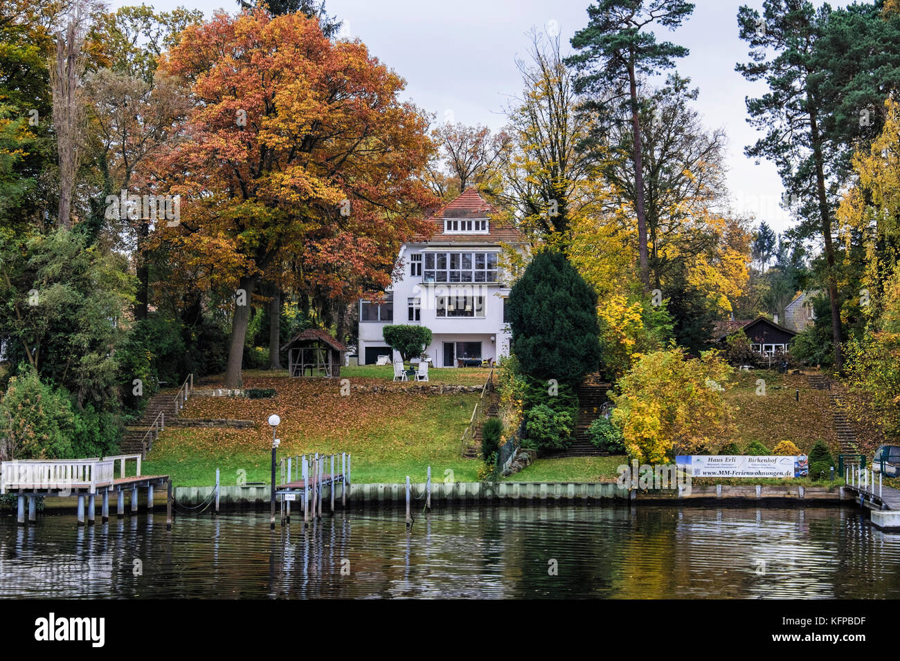 Berlin, Wannsee. Lake side houses with landing srages and mooring for