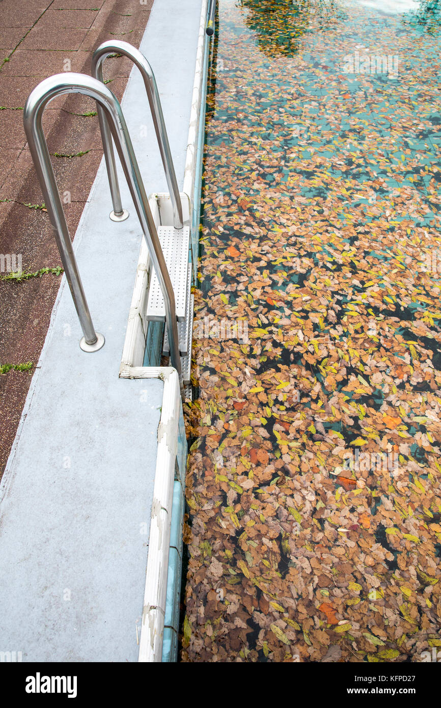Public swimming pool, closed for the season, in fall Stock Photo - Alamy