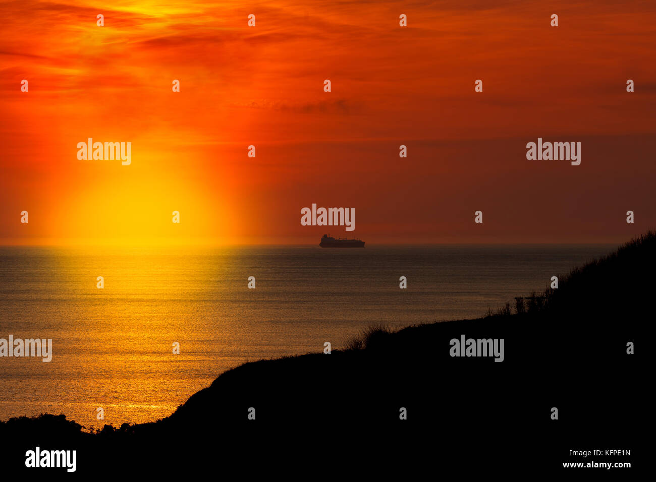 Amazing sunset with golden and black colors Stock Photo - Alamy