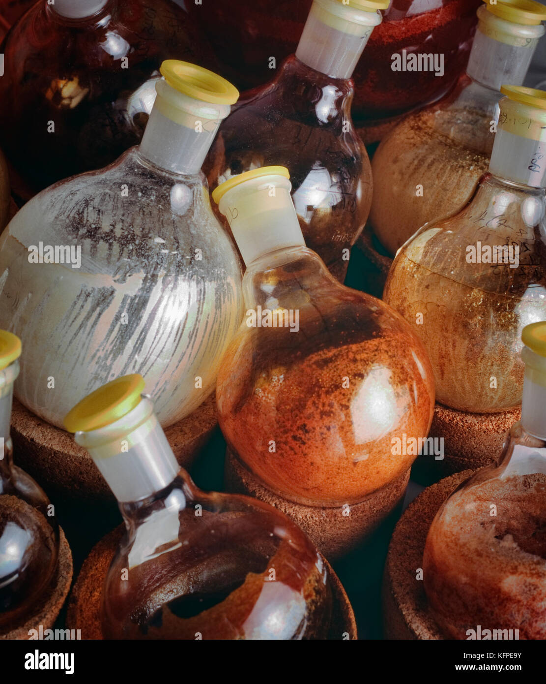 Flasks of residues from experiments in a pharmacological biochemistry laboratory to be investigated for future useful compounds. Stock Photo