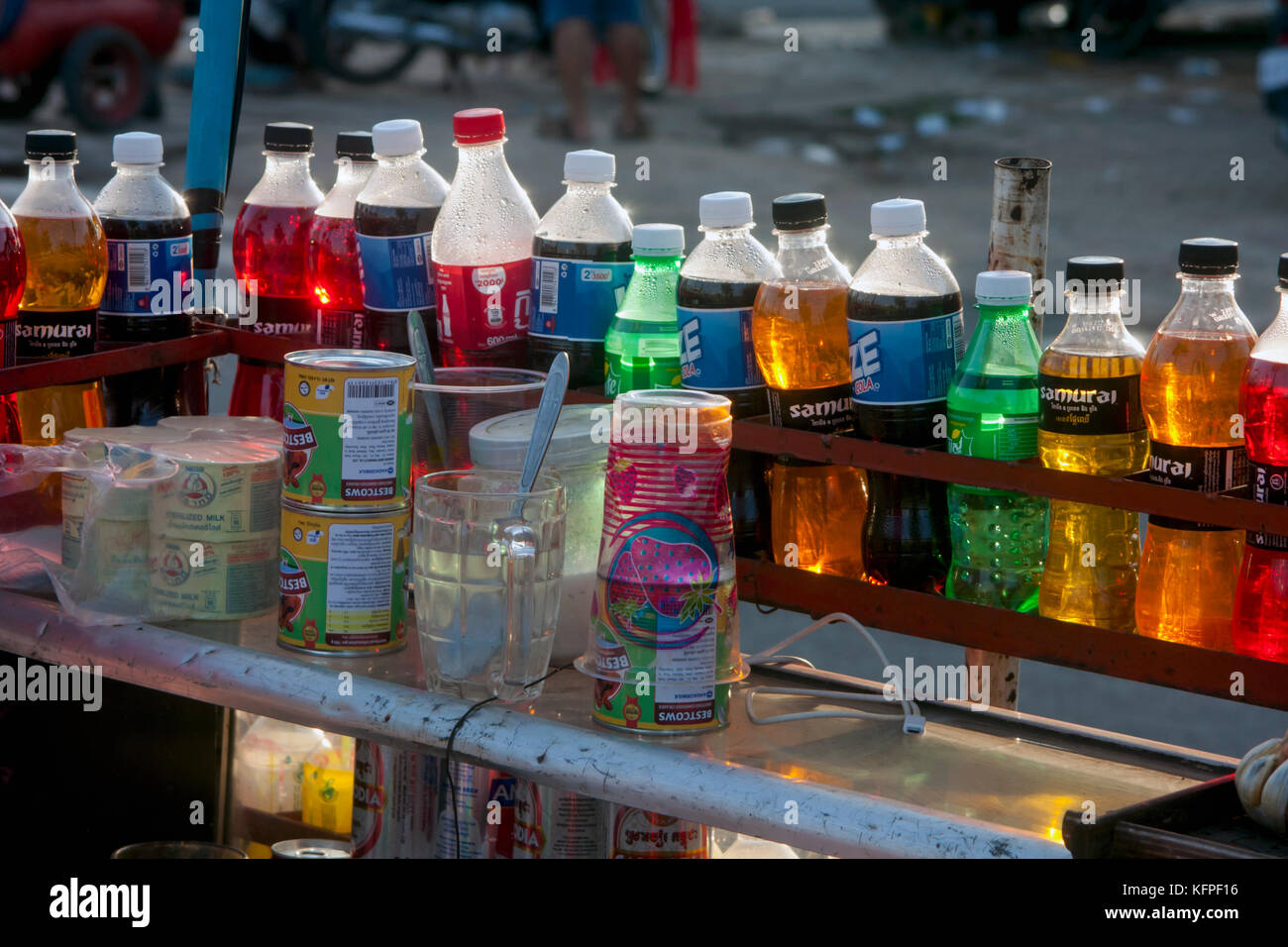 Energy drinks are for sale on a vendor's cart on a city street in Phnom Penh, Cambodia. Stock Photo
