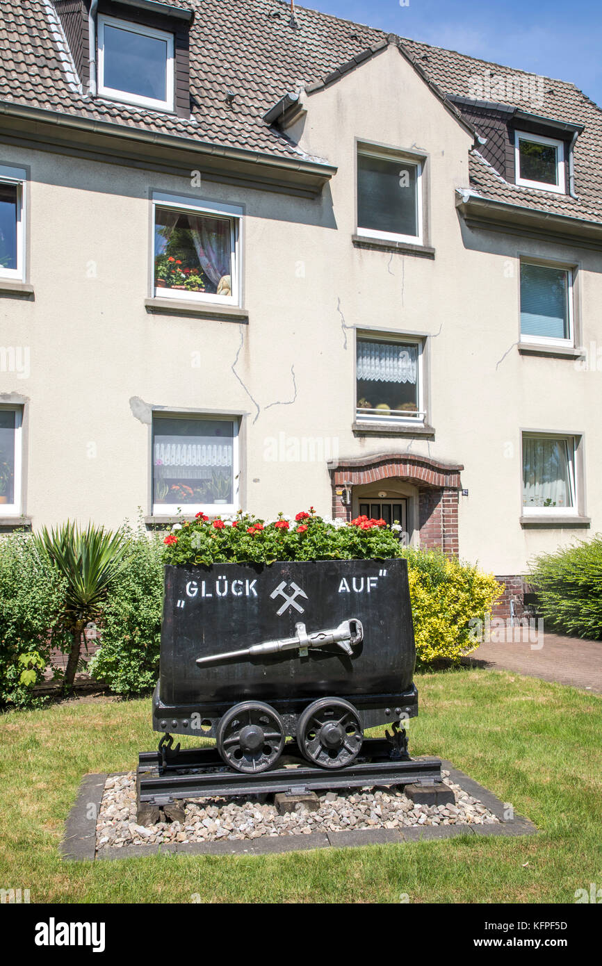 Old mining tram, lore, for decoration, memory of the Ruhr mining, in front of a residential building in Essen Carnap, Stock Photo