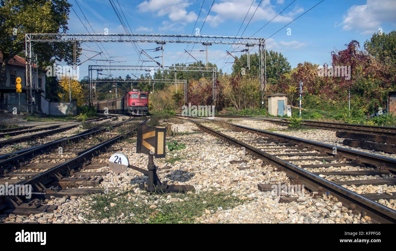 Serbia - Train crossing an intersection Stock Photo