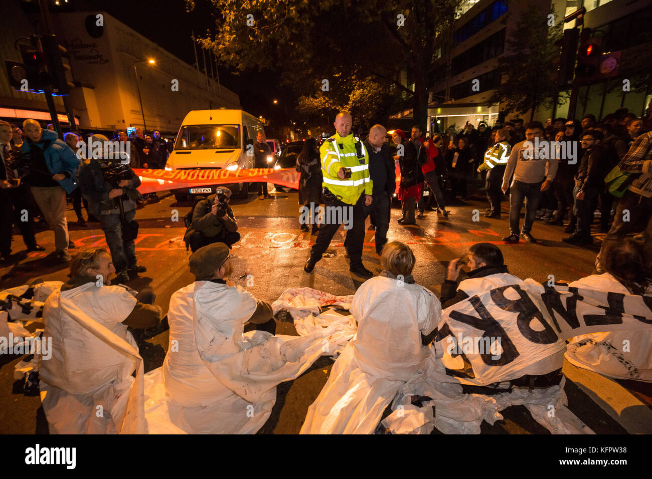 London, UK. 31st Oct, 2017. ‘Stop Killing Londoners’ environmental campaign activists perform a direct action road block in Baker Street during evening rush hour to demand urgent attention to prevent premature deaths from increasing city air pollution. Credit: Guy Corbishley/Alamy Live News Stock Photo