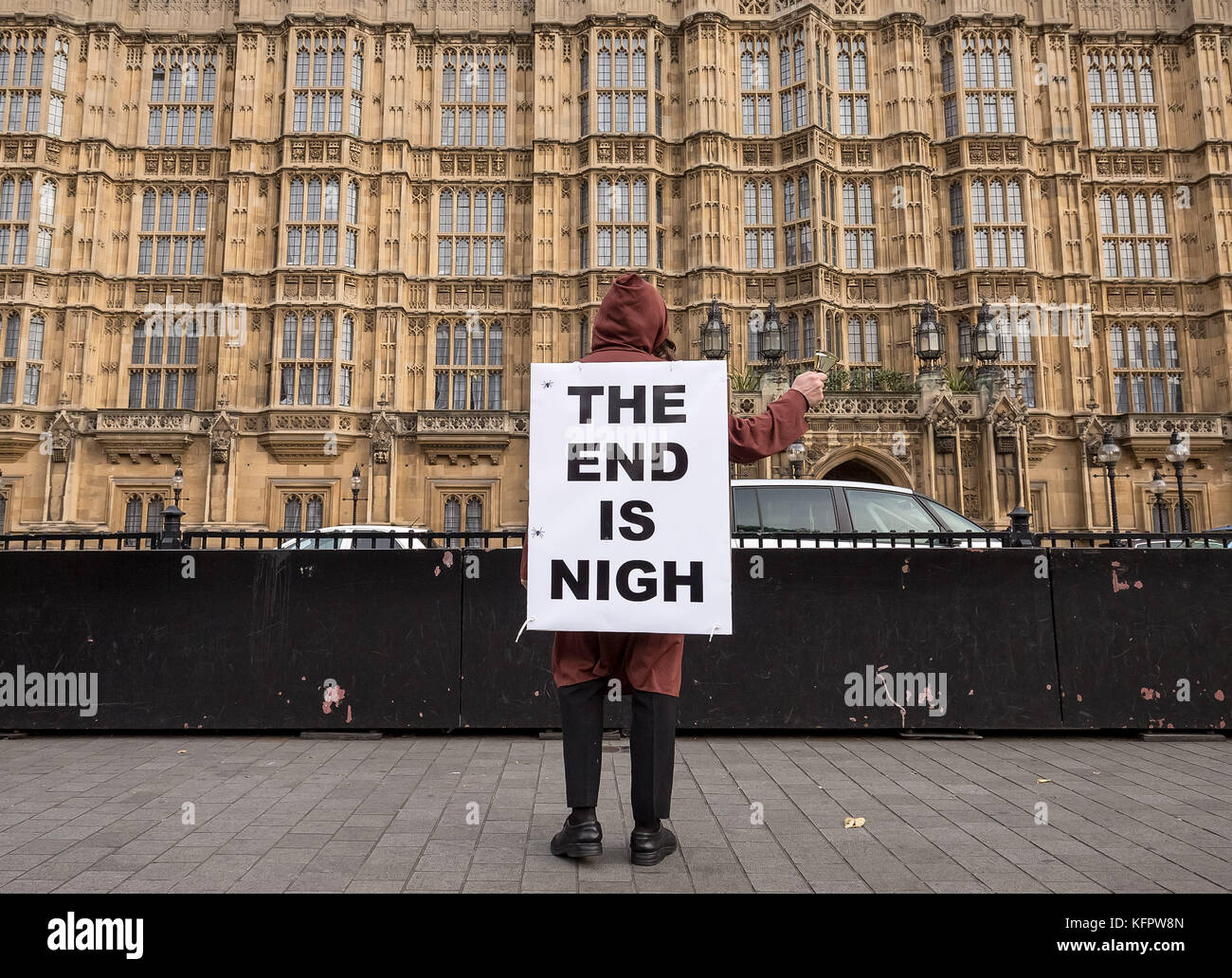 london-uk-31st-oct-2017-the-end-is-nigh-apocalyptic-sign-is-seen-near-KFPW8N.jpg