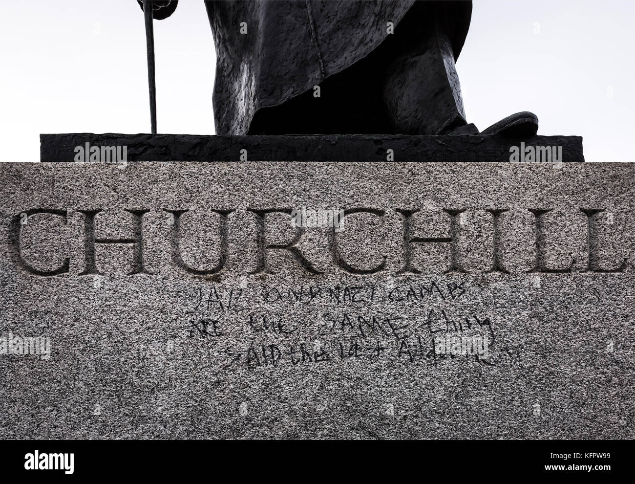 London, UK. 31st Oct, 2017. Statue of Winston Churchill in Parliament Square with graffiti reading “jail and nazi camps are the same thing” written by a Calais Jungle protester who was later arrested on suspicion of criminal damage and taken to a central London police station. Credit: Guy Corbishley/Alamy Live News Stock Photo