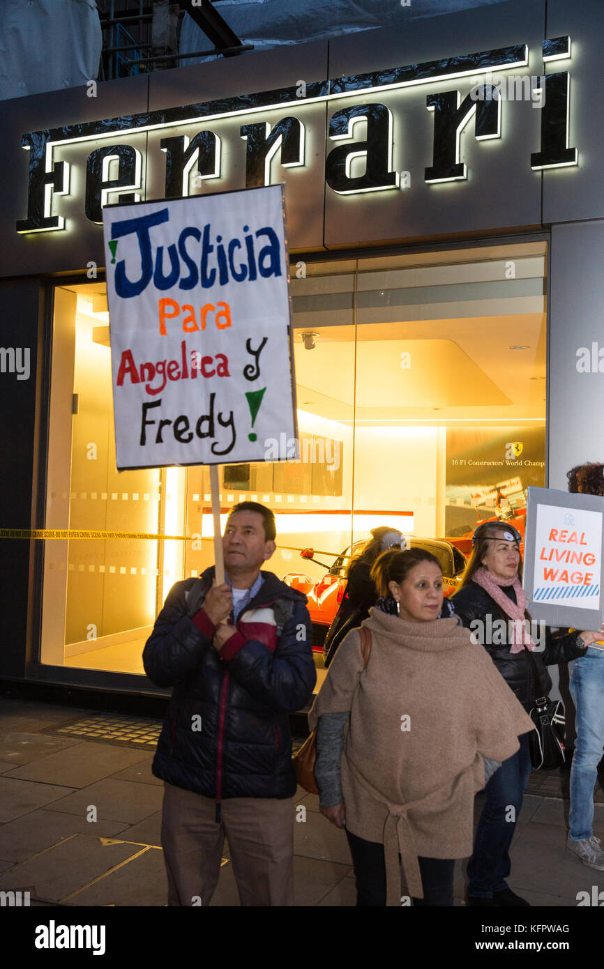 London, UK. 31st Oct, 2017. Supporters of migrant cleaners Angelica Valencia Bolanos and Fredy Lopez suspended without pay by contractor Templewood Cleaning for having joined trade union United Voices of the World and for having voted to strike for the London Living Wage protest outside luxury car dealer H.R. Owen's Ferrari showroom in South Kensington. The cleaners, a married couple, are the only cleaners responsible for cleaning H.R. Owen's Ferrari showroom via contractor Templewood Cleaning. Credit: Mark Kerrison/Alamy Live News Stock Photo