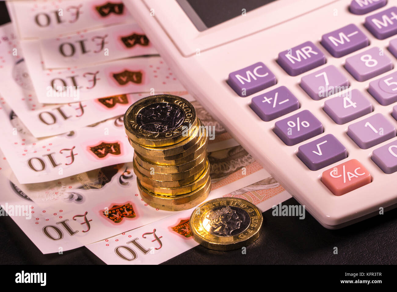 Calculator on new polymer sterling £10 ten pound notes and new pound