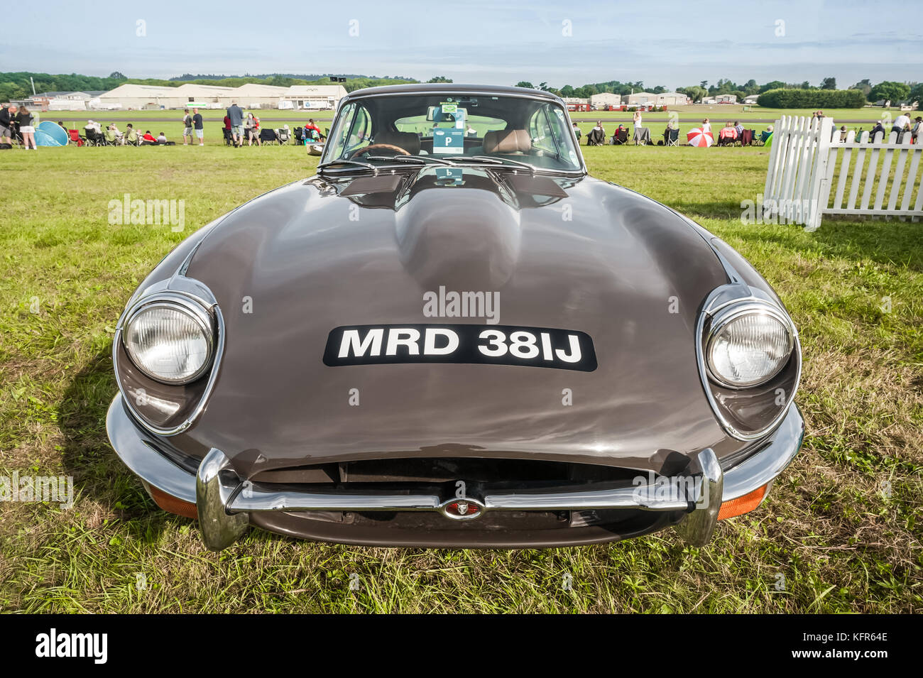 Dunsfold, UK - August 26, 2017: Wide-angle view of a vintage British Jaguar E-Type sports-car in Dunsfold, UK Stock Photo