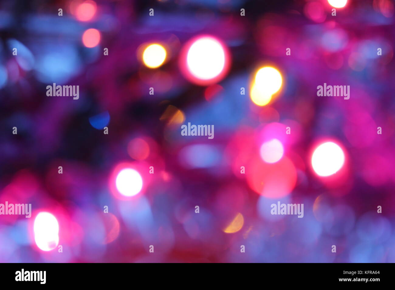 Christmas background with bright pink bokeh effect Stock Photo