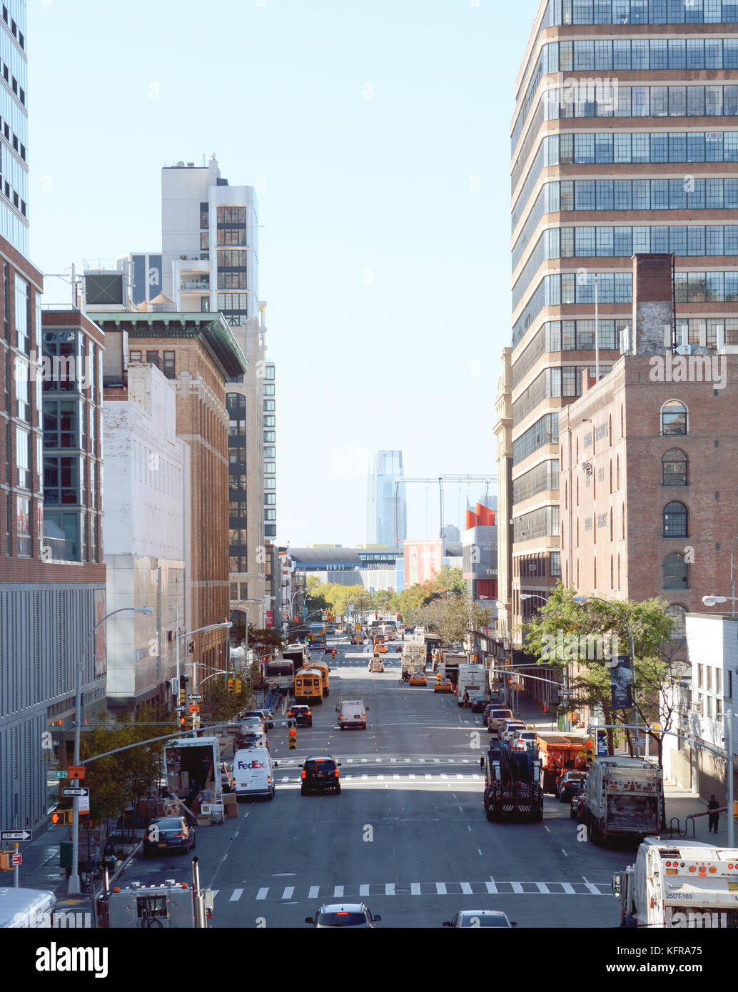 NEW YORK - OCTOBER 20, 2017: View south down 11th Avenue in Manhattan, seen from the High Line elevated park. Traffic travels down the one way street  Stock Photo