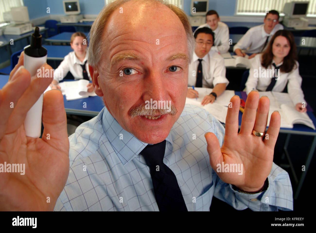 Teacher Eric Evans, Ysgol Dyffryn Taf School, Whitland, W.Wales, using a whiteboard for a class. Stock Photo