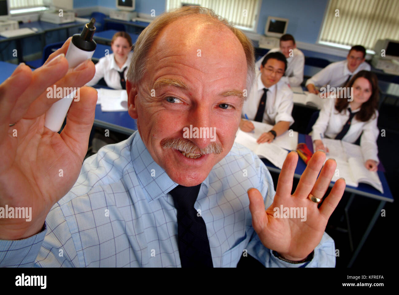 Teacher Eric Evans, Ysgol Dyffryn Taf School, Whitland, W.Wales, using a whiteboard for a class. Stock Photo