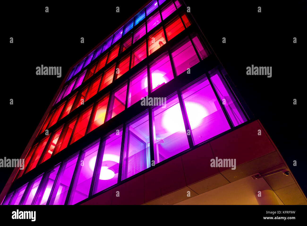 Illuminated facade of the Allbau headquarter building, Essen, Germany, during Essen Light Festival, Stock Photo
