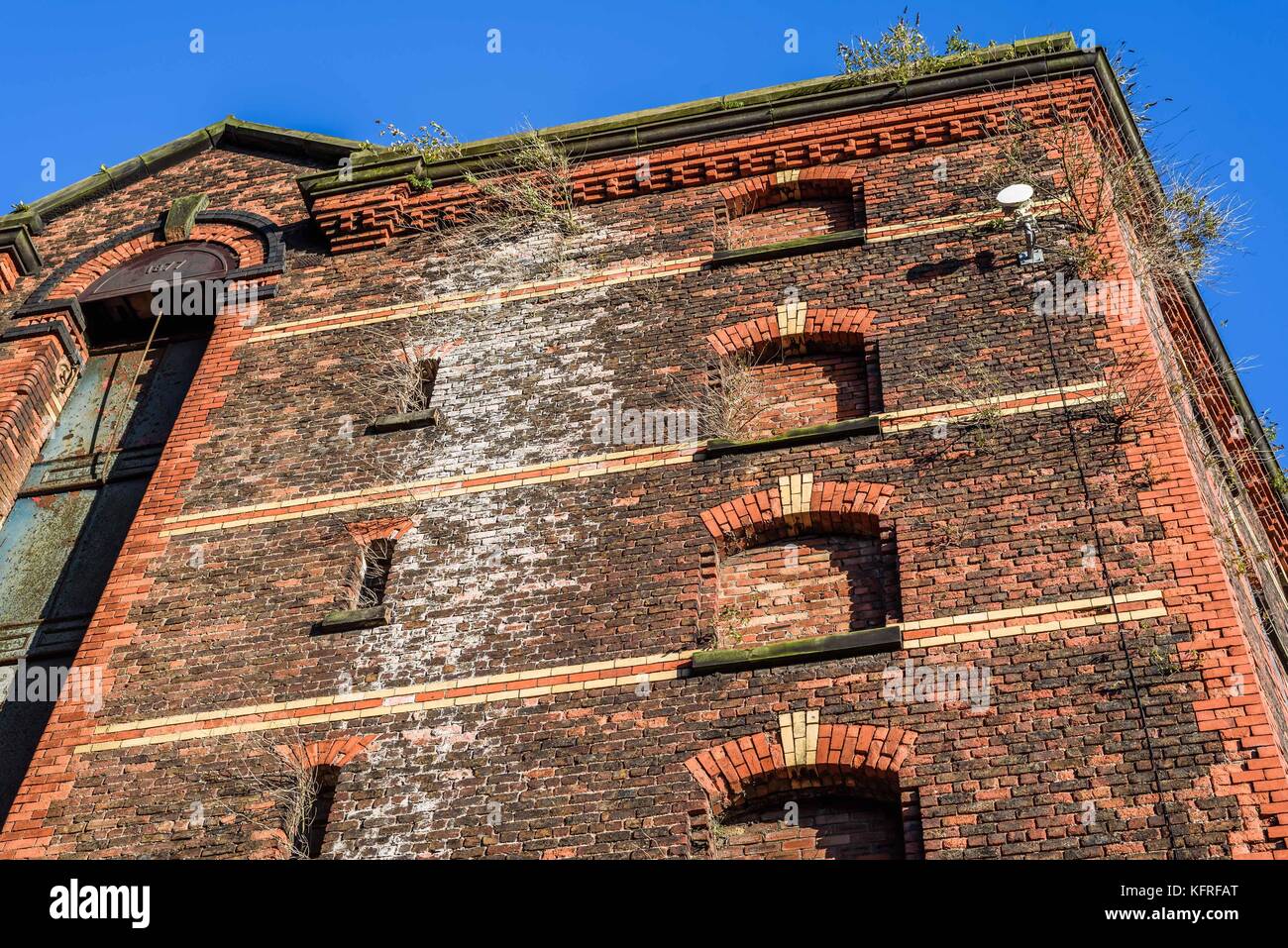 Abandoned red brick dock warehouse in Liverpool. Stock Photo