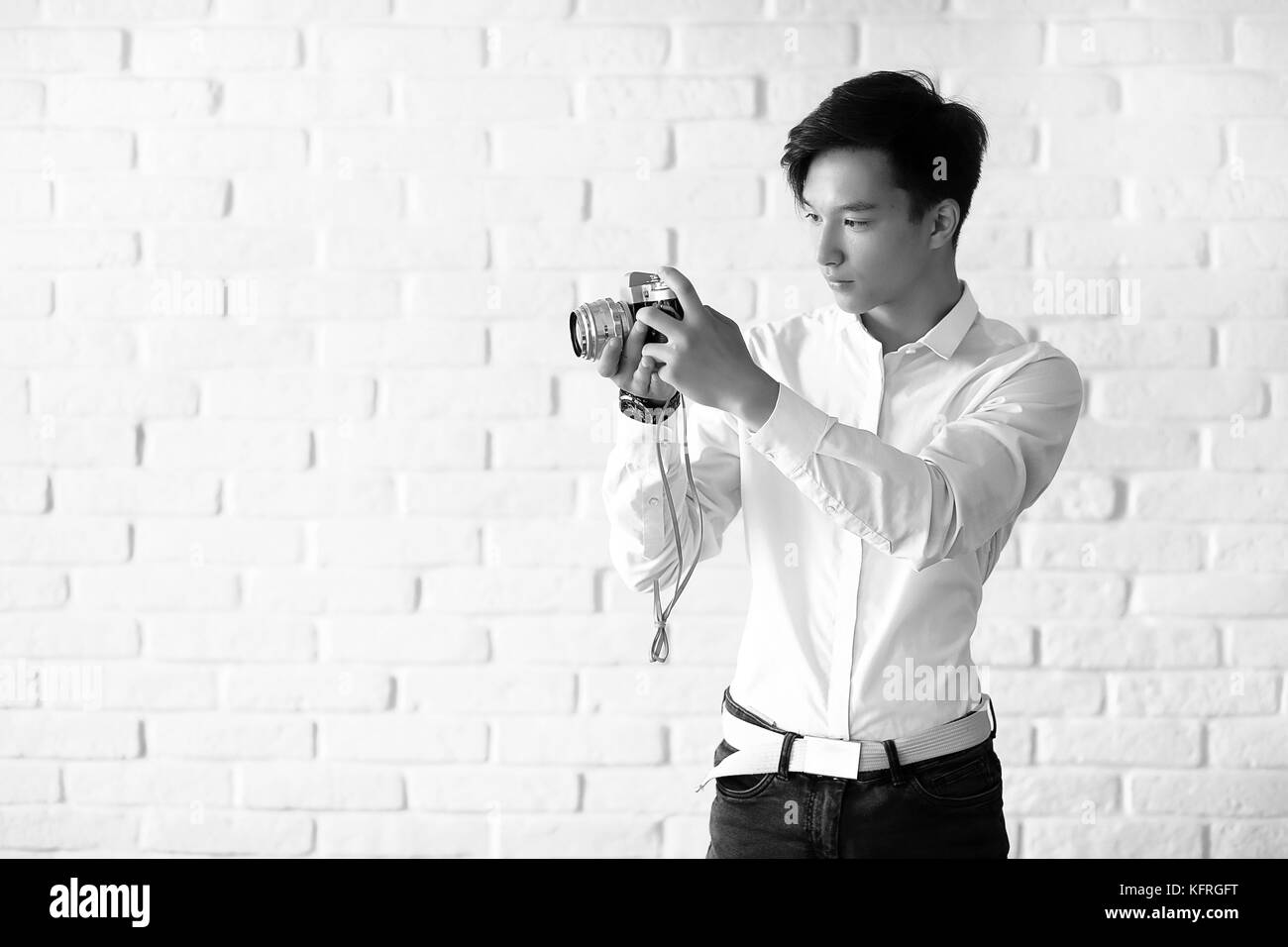 Asian Man With A Camera Black And White Stock Photo Alamy