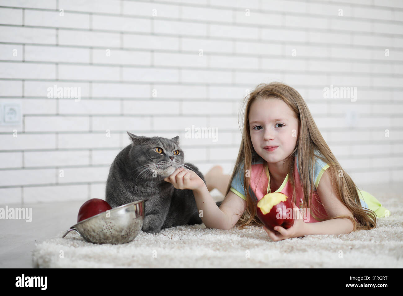 little girl lies on the floor Stock Photo - Alamy