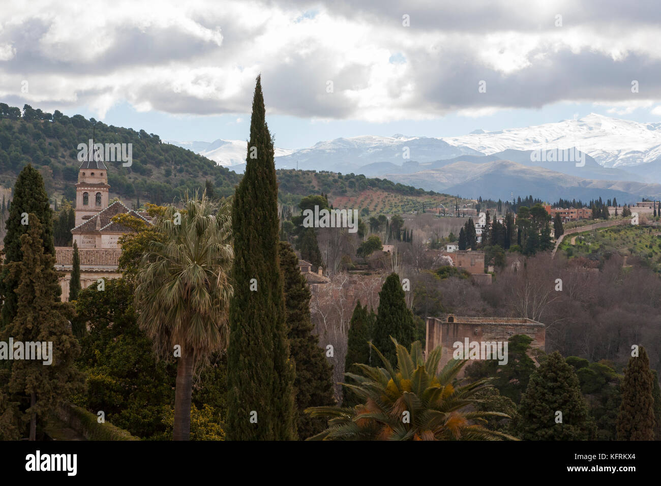 View from the Torre de la Vela, Alcazaba, Alhambra, Granada, Spain to the snows of the Sierra Nevada Stock Photo