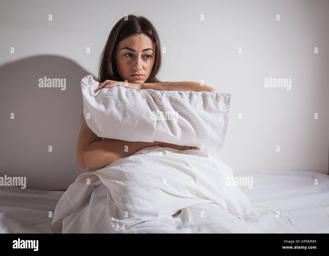 Depressed young woman suffering from insomnia, stress, depression
