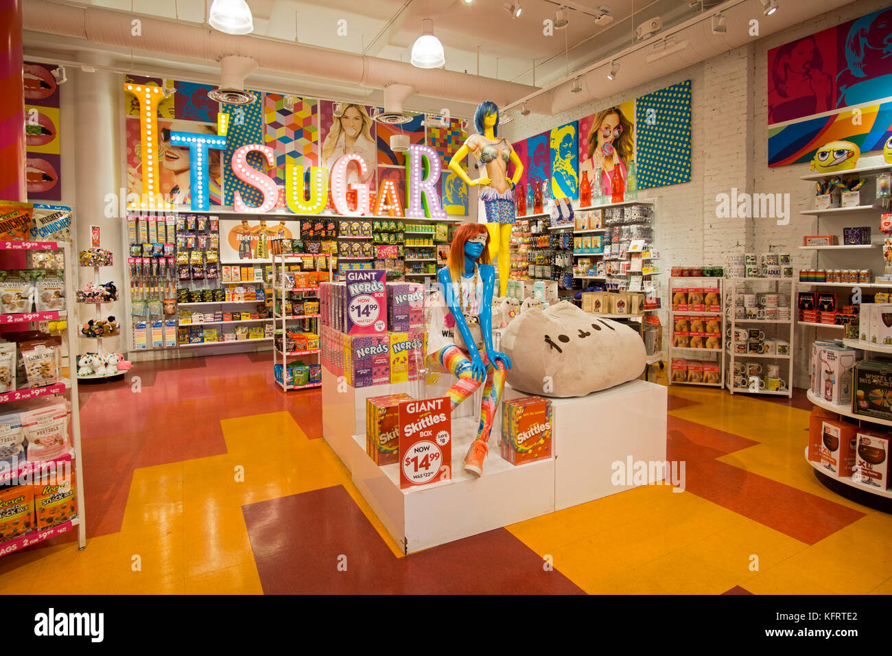 The colorful interior wide view of It'Sugar, a candy by the pound chain store, this one being on Broadway in Greenwich Village Stock Photo