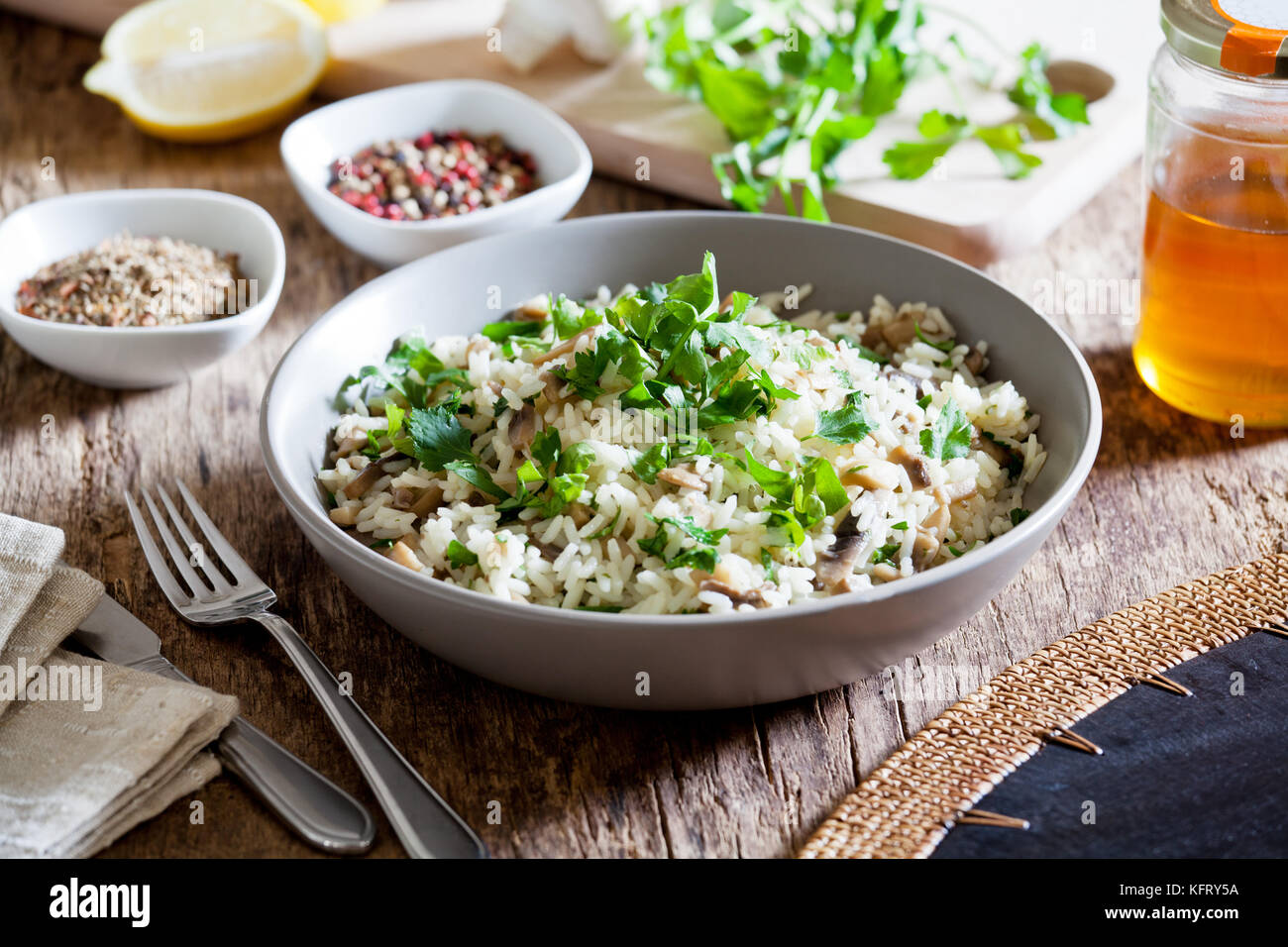 Bowl of homemade rice with wild mushrooms Stock Photo Alamy