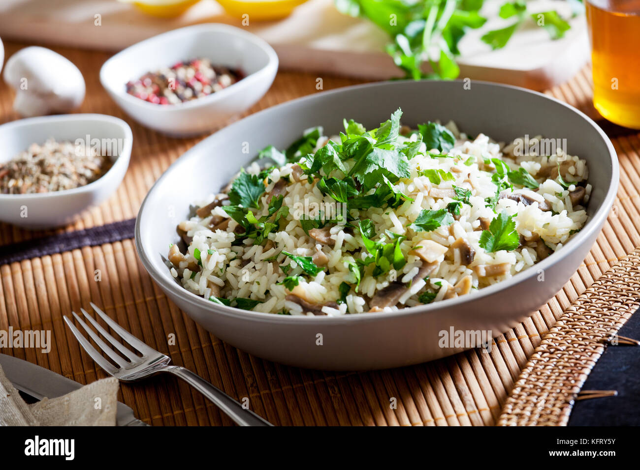 Bowl of homemade rice with wild mushrooms Stock Photo Alamy