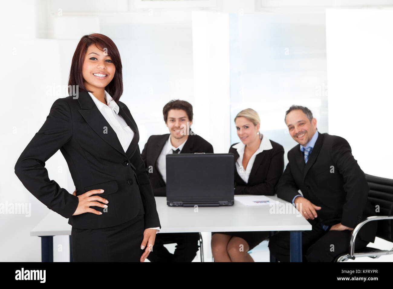Portrait successful business woman and her team Stock Photo - Alamy