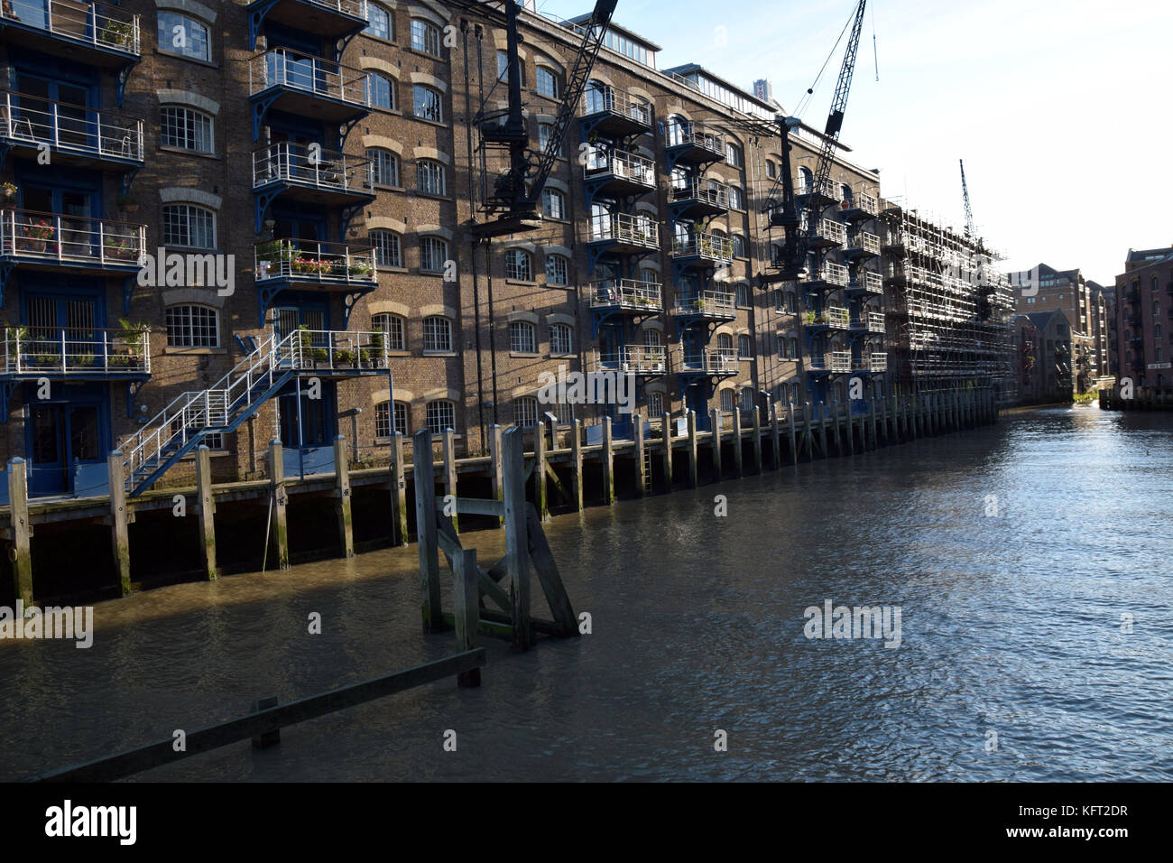 some old flats near Thames river in London canary wharf peninsula Stock