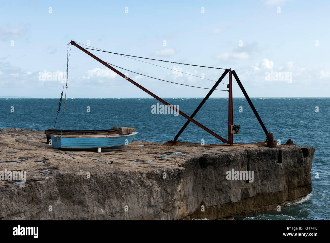 Crane lifting small boat hi-res stock photography and images - Alamy