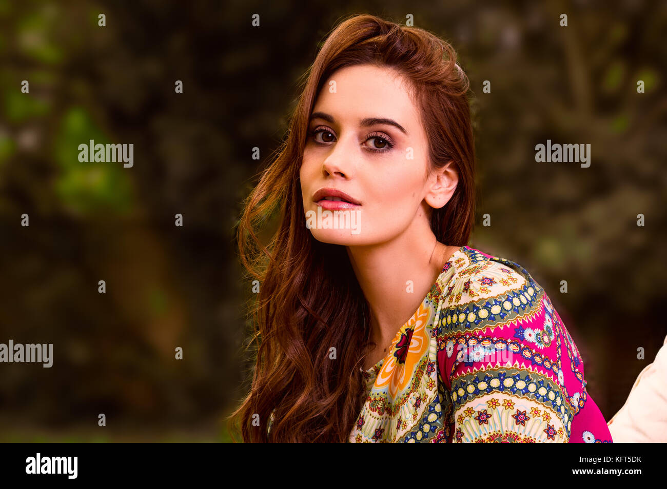 In the garden with a young woman Stock Photo - Alamy