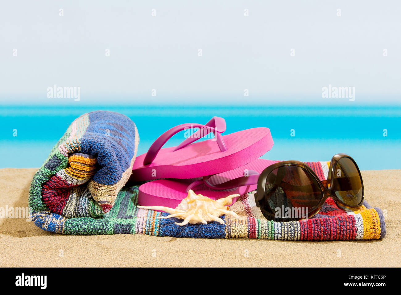 Flip flops on the beach Stock Photo - Alamy
