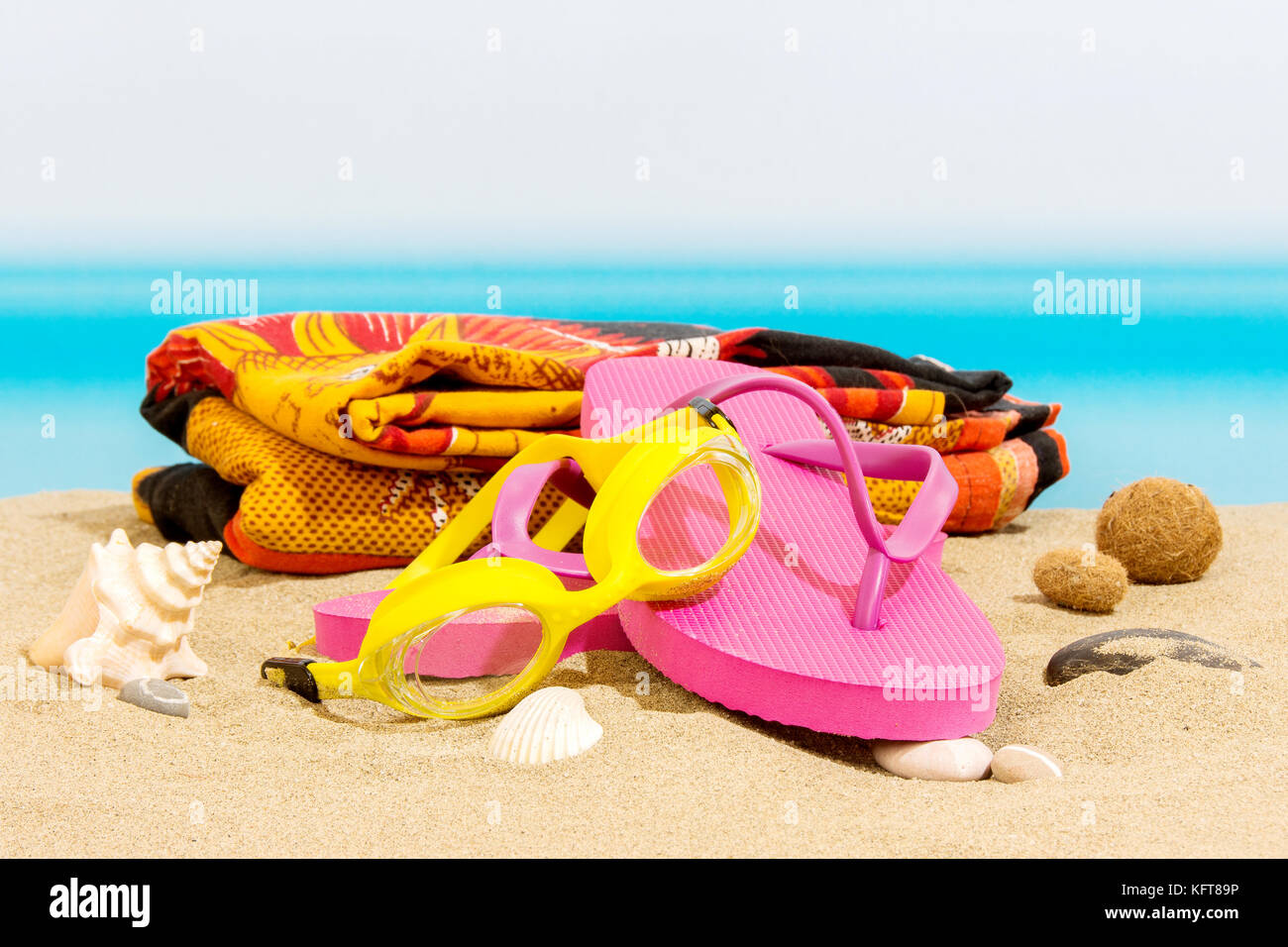 Flip flops on the beach Stock Photo - Alamy