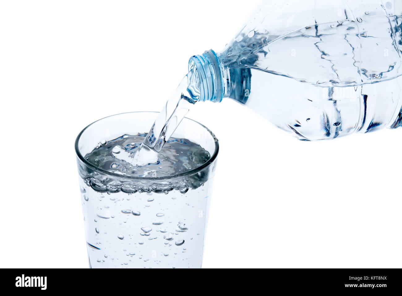 Filling glass with water from plastic bottle Stock Photo Alamy