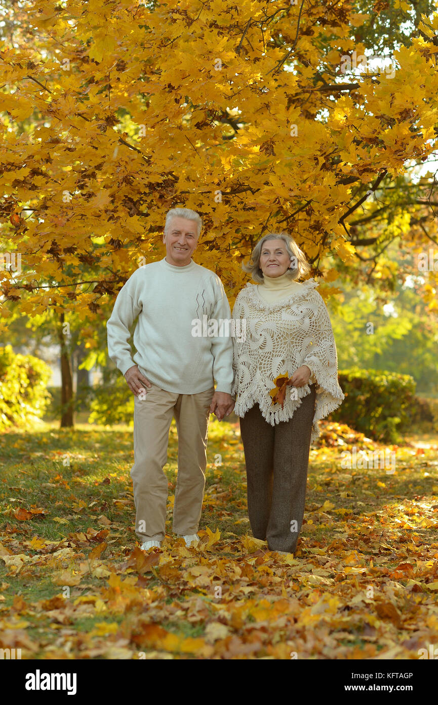 Senior couple relaxing in park Stock Photo - Alamy