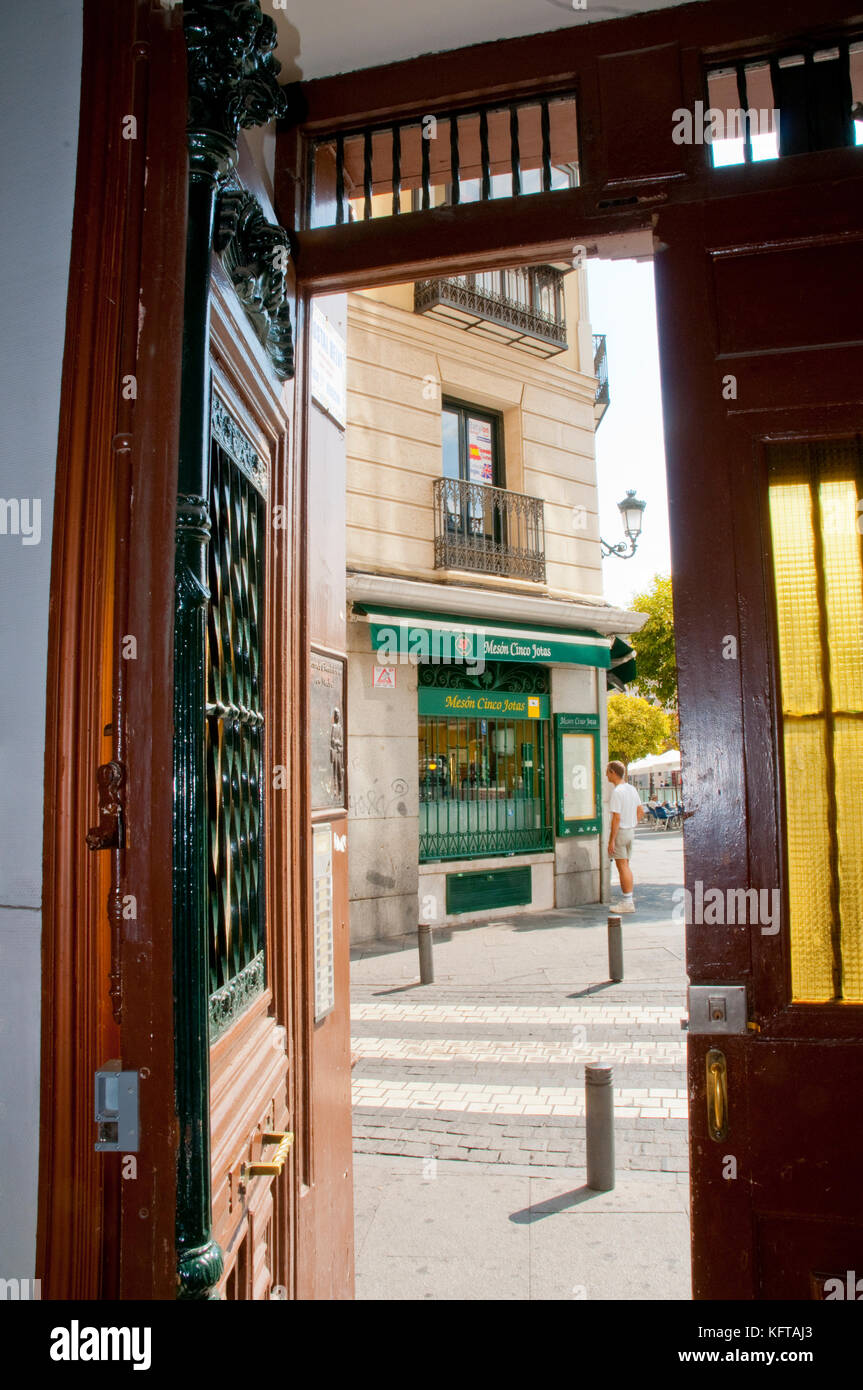 View from an open door. Santa Ana Square, Madrid, Spain. Stock Photo