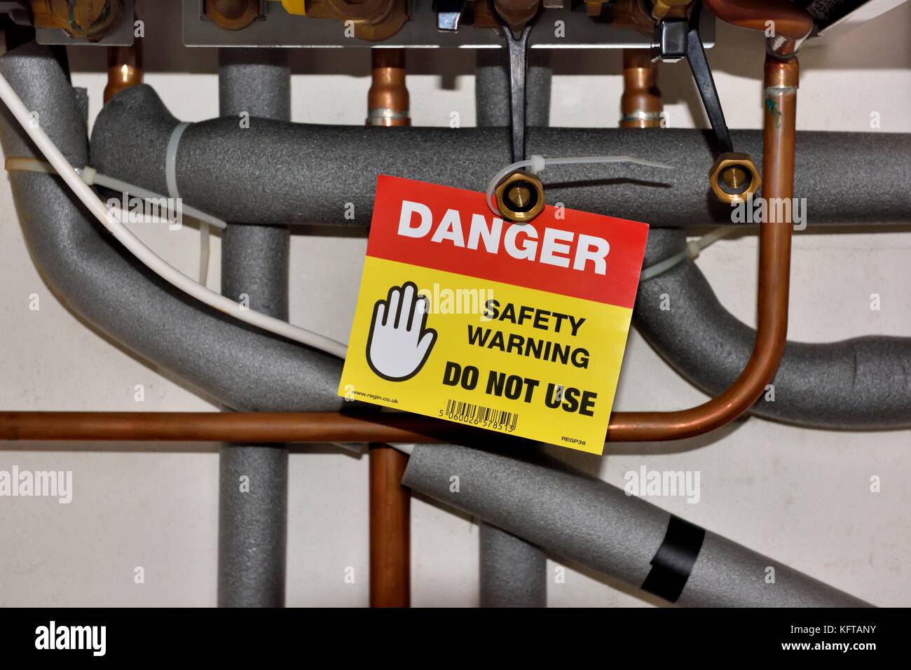 Danger safety warning do not use on a domestic boiler Stock Photo Alamy