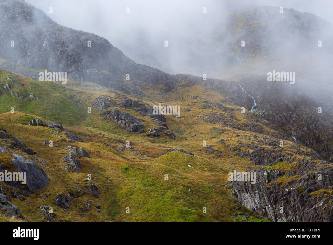 Foggy view of mountain Stock Photo - Alamy