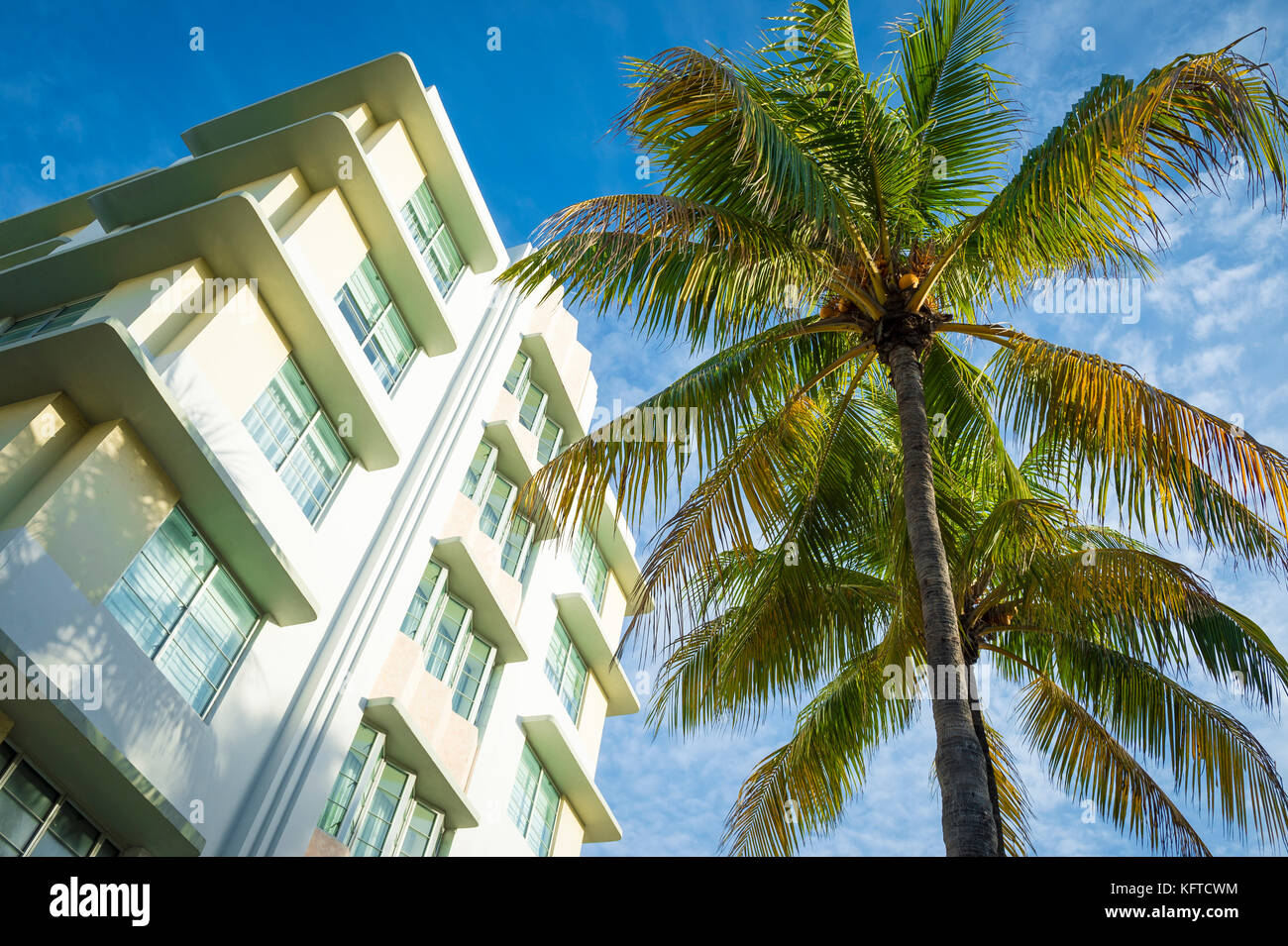 Classic 1930s art-deco era architecture and palm trees on Ocean Drive, Miami Beach. Stock Photo