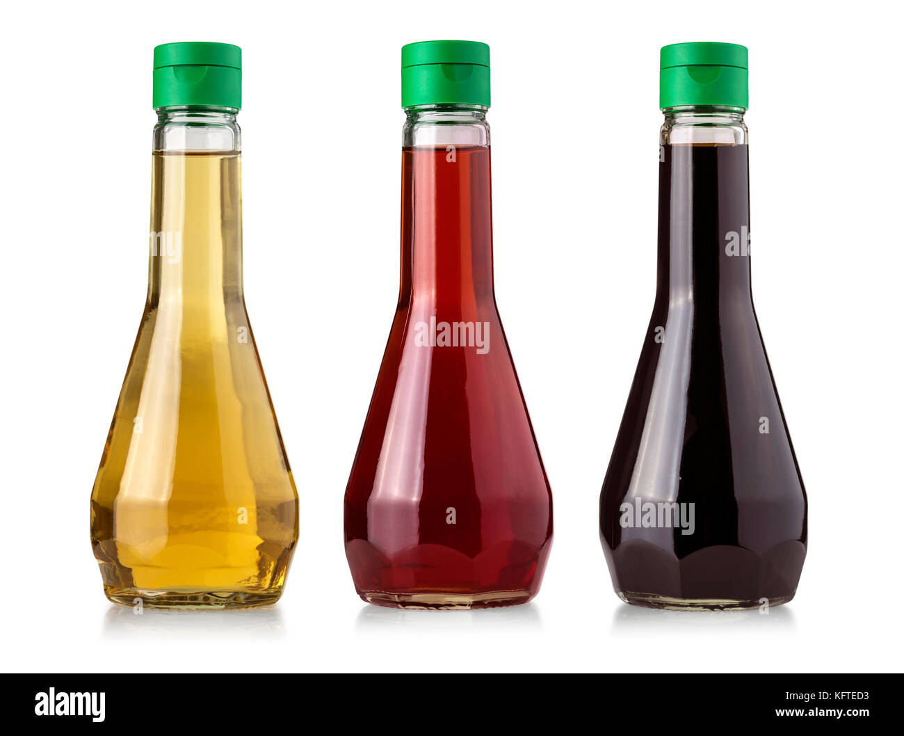 Glass bottles of vinegar isolated on white background Stock Photo Alamy
