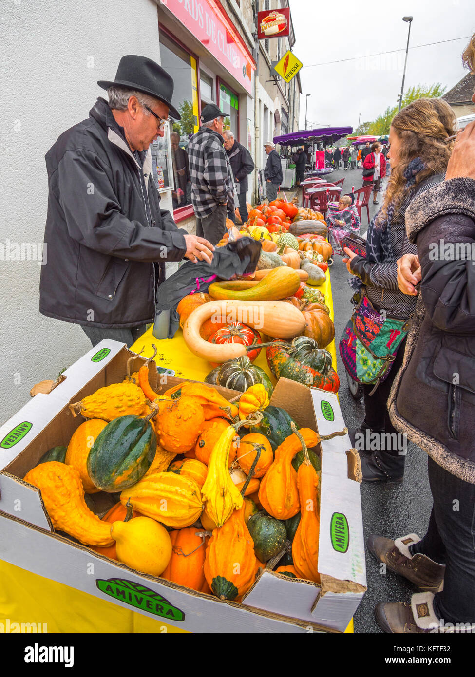 Market stall table full of pumpkins, potirons and gourds - France. Stock Photo