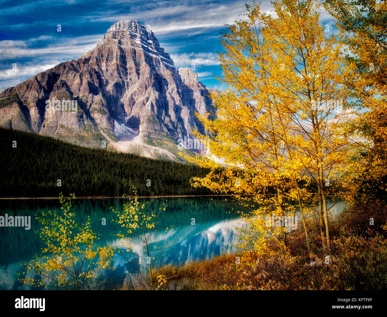 Waterfaowl Lakes and Mt. Chephren with fall colored aspens.  Banff National Park. Alberta, Canada Stock Photo